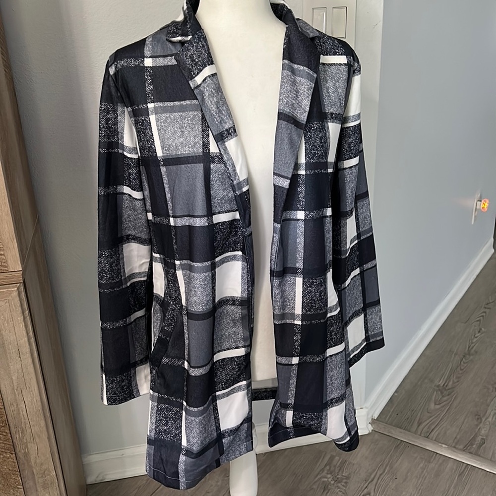 New without tags. Never worn. Flannel blazer